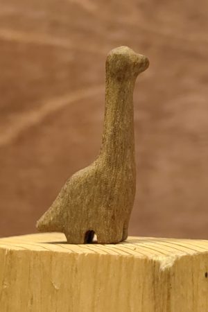 بچه دایناسور چوبی